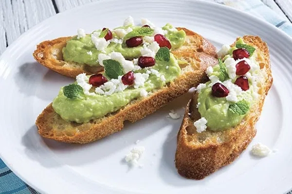 Smashed Avocado, Feta & Pomegranate Crostini